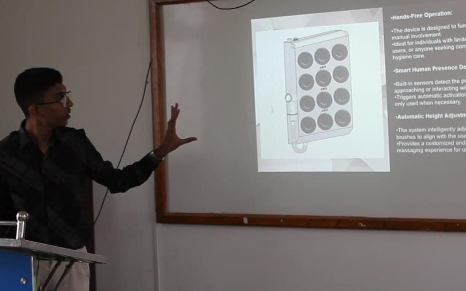 Saatvik Karthikeyan presenting his IoT skin cleansing apparatus at MIT College of Agriculture and Technology